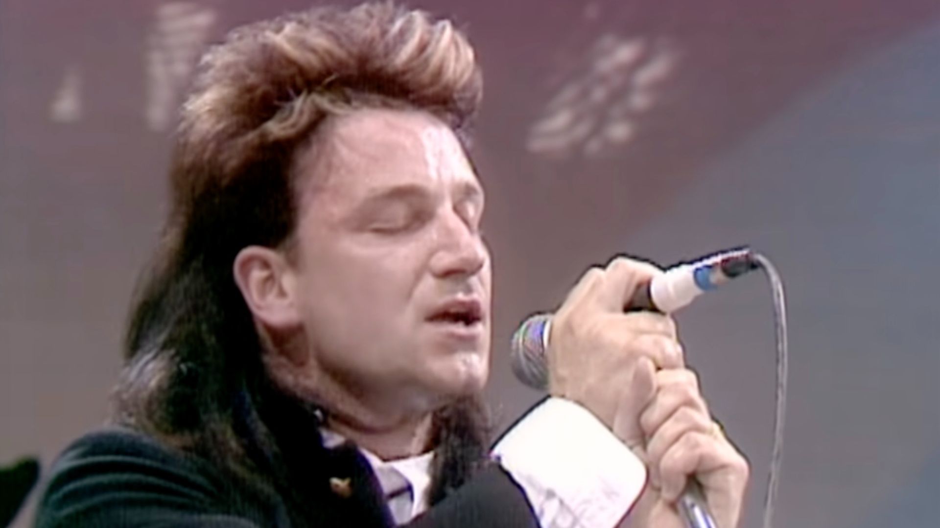 Как экспериментальная песня о героине зажгла Live Aid и превратила U2 в королей стадионного рока